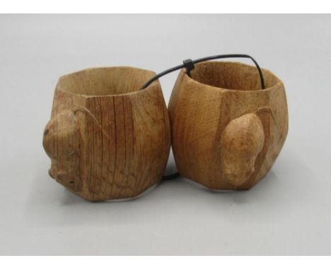 Robert Mouseman Thompson of Kilburn - a pair of octagonal napkin rings, carved with signature mouse H5cm D8cm