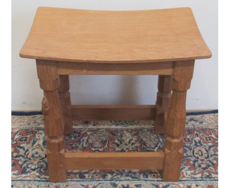 Robert Mouseman Thompson of Kilburn - an oak joint type stool, rectangular adzed dished top, on octagonal baluster supports, 