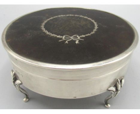 George V silver and tortoiseshell trinket box with silver pique wreath &amp; bow motif to the lid, four cast feet and red vel
