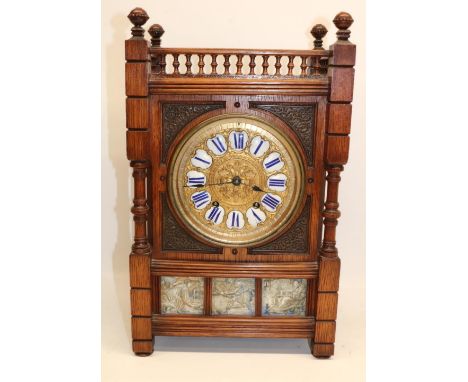 Early 20th Century French Aesthetic Movement oak mantle clock, rectangular case with ball finials spindle gallery, three inse