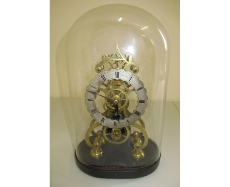 Wm. Gray, Leicester, 19th Century brass skeleton clock timepiece mounted on ebonised oval base, signed 4 1/2" silvered Roman 
