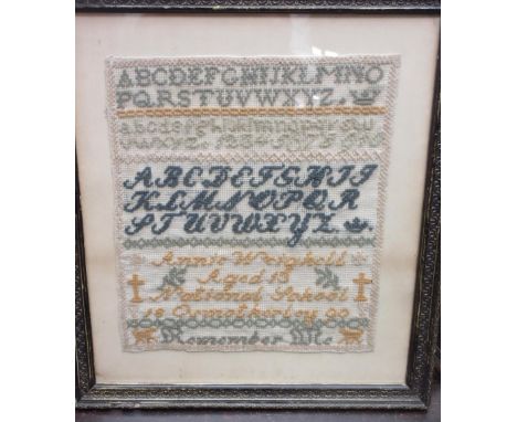 Victorian sampler, worked in coloured wools with the alphabet by Annie Weighall, National School, Osmotherley 1890, 36cm x 31