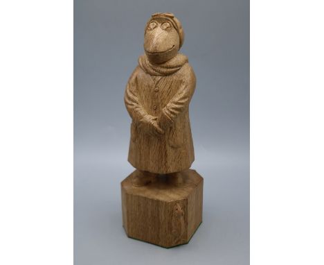 Robert Mouseman Thompson of Kilburn - carved oak figure of Mr Toad of Toad Hall, wearing a driving coat, scarf, hat, boots an
