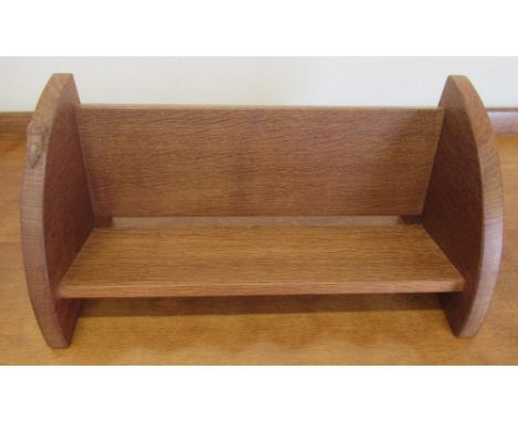 Robert Mouseman Thompson of Kilburn - an oak book trough, single shelf with shaped adzed ends, carved with signature mouse, W