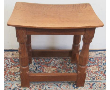 Robert Mouseman Thompson of Kilburn - an oak joint type stool, rectangular adzed dished nailed top, on octagonal baluster sup