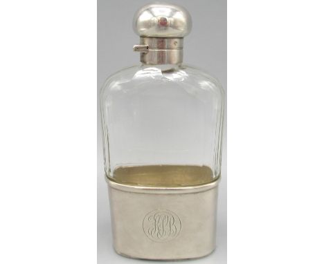 George V cut glass and silver hip flask, with silver mounted hinged lid, removable stirrup cup with gilt interior, monogramme