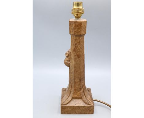 Robert Mouseman Thompson of Kilburn - an oak table lamp octagonal column on a square base, carved with signature mouse, H31cm