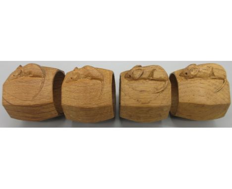 Robert Mouseman Thompson of Kilburn - a set of four octagonal napkin rings, carved with signature mouse H5cm D8cm (4)