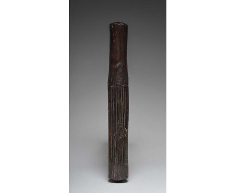 A Polynesia tapa beaterwith carved flutes along three sides,33.5cm long, with a wall mount. (2)