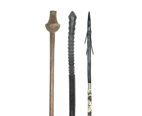 An African staffwith a baluster finial and bifurcated base,175.5cm long,a shaped club, with a tapered stepped head, 93.5cm lo
