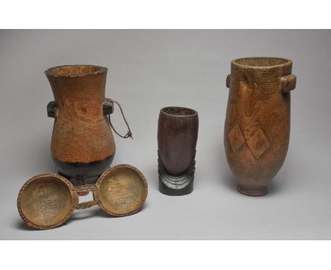 A Zulu milk pailNkandla, South Africawith a pair of lug handles and three relief lozenges to either side,37cm high, a South A