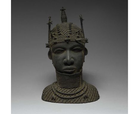 A Benin head of an Obacast bronze, with an ornate headdress and high neck ring,29.5cm high.ProvenanceFrank Dalvin, London.