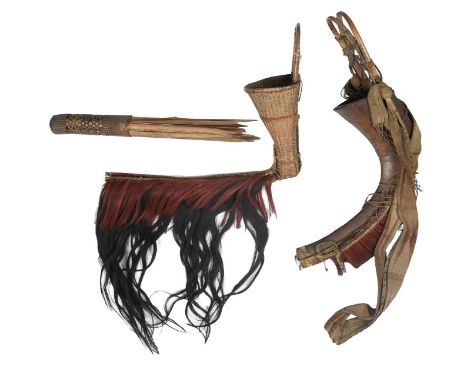 A Naga panji containerNagalandof horn shape with applied dyed hair tails, with a bound rattan loop and a cotton sash,40cm hig