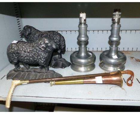 A copper hunting horn; a riding crop; an address stamp; 2 pairs of pewter candlesticks (1 converted); a pair of cast iron doo