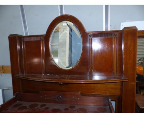 A 1920's mahogany fireplace surround with shelf and mirror