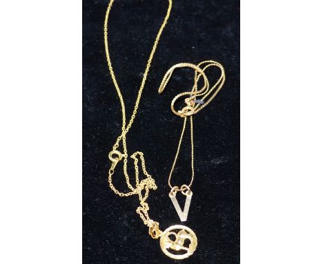 A 9 carat hallmarked gold Aries the ram pendant, 1.3 gm, on chain; a 9 carat hallmarked gold 'V' pendant on chain, stamped '9