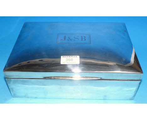 A large silver cushion shaped rectangular cigar box, c. 1920's, marks unclear