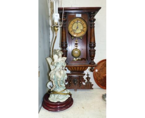 A 19th century Vienna wall clock with spring driven striking movement no glass; a Capodimonte style table lamp (a.f.)