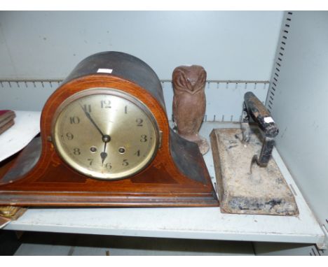 A rectangular wall mirror in ''antique" cream frame; a 1930's chiming mantel clock; a billiard iron; an owl doorstop