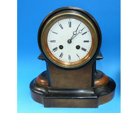 A late 19th century walnut and ebony cased mantel clock