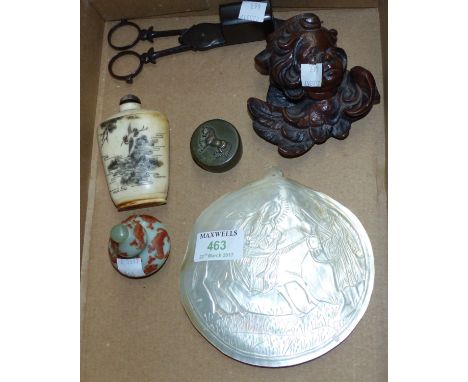 A mother-of-pearl shell carved with nativity scene; a modern oriental bone snuff bottle; a ceramic snuff bottle; a small copp