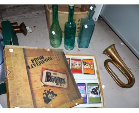 A brass and copper bugle with Australian badge; a Lurpak toast rack; Beatles tapes