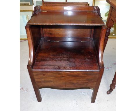 An 18th century mahogany commode with hinged shelf over box seat on square legs