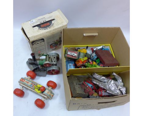 A collection of vintage toys to include a boxed Mamoo steam roller and various Dinky and Corgi die cast cars