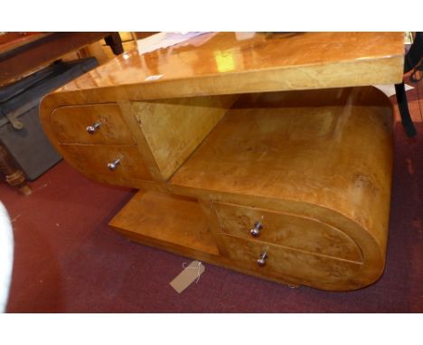 An Art Deco style burr walnut 'S' shape unit with an arrangement of drawers, H:65cm W:94cm D:60cm