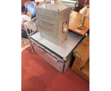 An aviator style trunk H-57cm W-96cm D-75cm together with a military case H-60cm W-50cm D-30cm