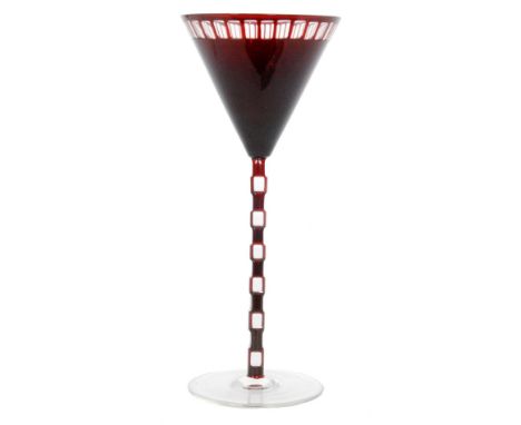 Otto Prutscher - Meyr's Neffe - A stemmed wine glass circa 1906 with a circular spread foot below a ruby cased and ladder cut