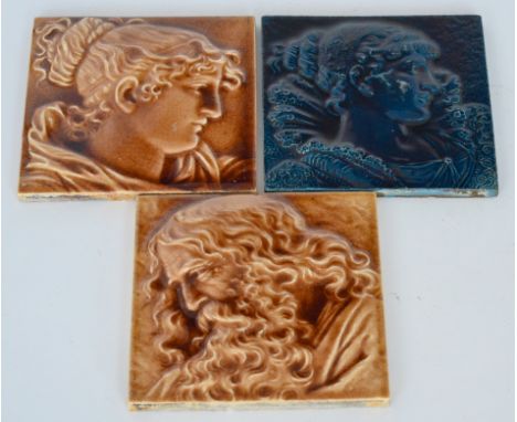 J & W Wade & Co (Flaxman Tile Works) - Three late 19th Century relief moulded portrait tiles, the first decorated with a bear