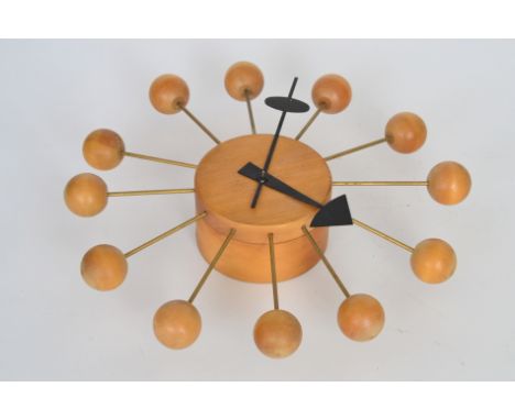 Irving Harper - George Nelson - Howard Miller - An original ball clock with cylindrical body mounted with black enamelled han
