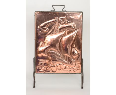 Unknown (English) - A copper firescreen, the repousse work panel detailed with a galleon at sail within a wrought iron frame,