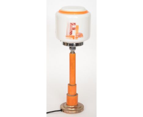Unknown - An Art Deco lamp, circular stepped chrome base below ribbed phenolic central column supporting domed amber glass sh