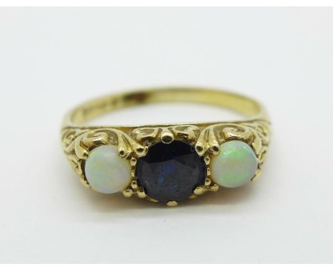 A 9ct gold, opal and sapphire ring, 1.8g, J 