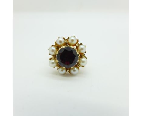 A 9ct gold, garnet and pearl cluster ring, 4.2g, M 