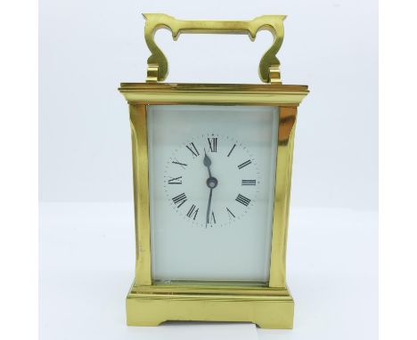 A brass and four glass sided carriage clock, stamped ACC, no key 