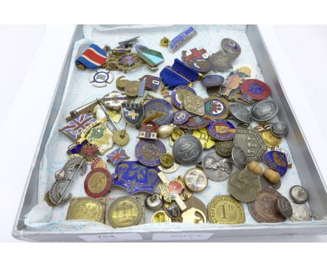 A collection of enamel badges, etc. 