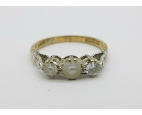 A 9ct gold three stone ring, 1.9g, M 