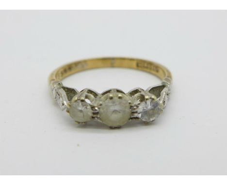 A 9ct gold three stone ring, 1.9g, M 