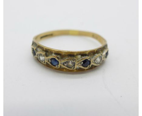 A 9ct gold half eternity ring, 1.1g, M/N 