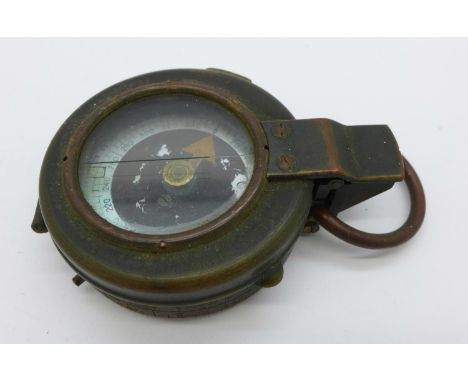 A WW1 military issue compass ER Watts and sons, London, marked 1917, no 73732, also marked AE with broad arrow 