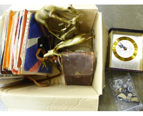 A collection of mainly 1970's 7" singles, a folding camera, RAF cloth badge, other enamel badges, brass deer, etc. 