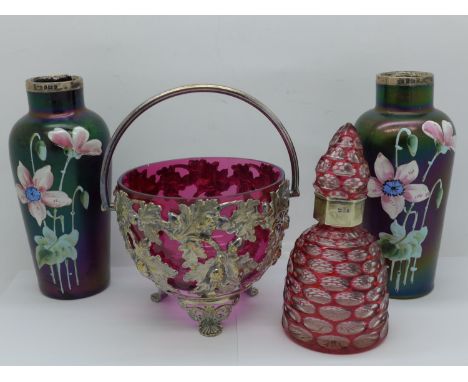 A pair of lustre glass vases with enamel decoration and silver rims, a cranberry glass basket and a scent bottle, a/f 