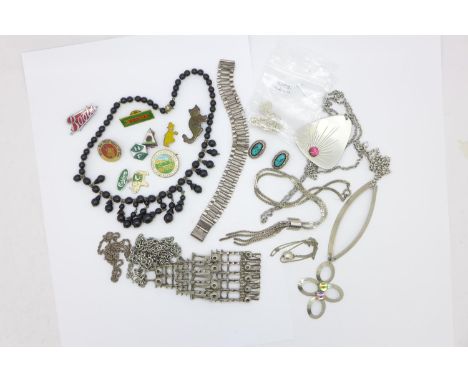 A collection of modernist jewellery, a silver bracelet, badges including a Boots (the Chemists) enamel badge 