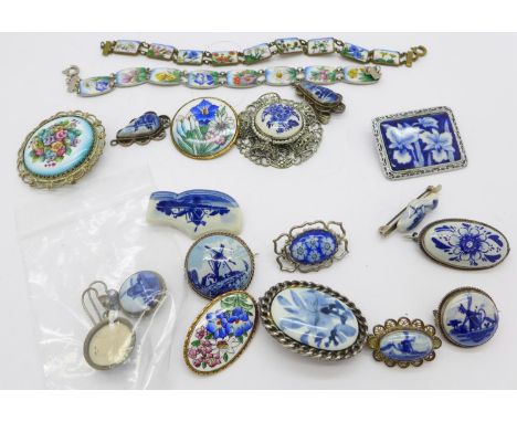 A collection of jewellery including Delft and two enamel panel bracelets decorated with flowers 