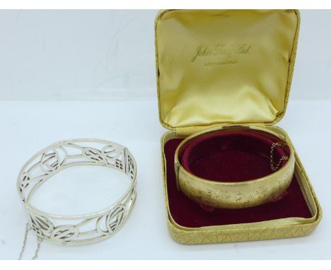 A 925 silver bangle, 35g and a rolled gold bangle