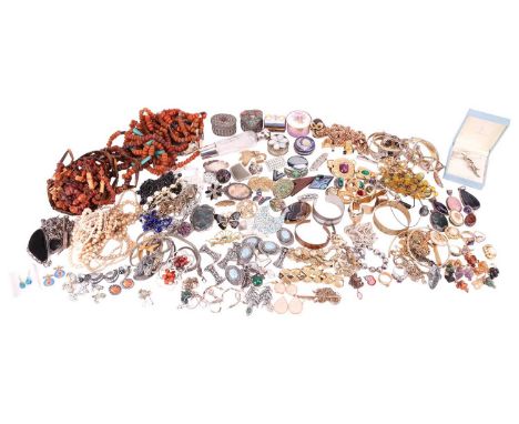 A large quantity of costume jewellery consisting of plated and silver necklaces, bracelets and earrings, along with a quantit