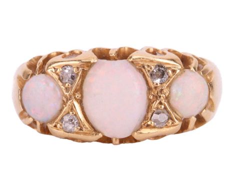 An opal three-stone half-hoop ring, the graduated oval opal cabochons interspersed with four mine-cut diamonds in pierced yel